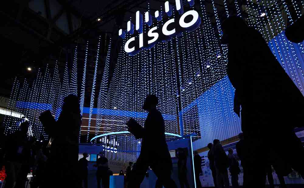 Cisco realism: record revenue, optimistic forecast and redundancy planning